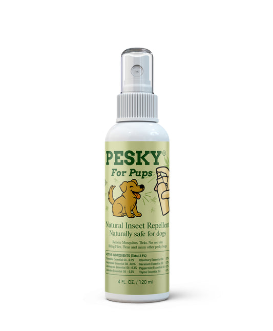 Bottle of natural insect repellent for dogs on a white background